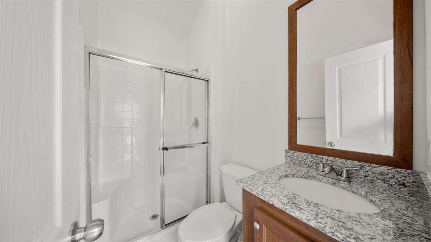 2784 Monterey Road, Unit 48A San Jose, CA 95111 - Photo 14 of 15 a bathroom with a granite countertop sink toilet and shower