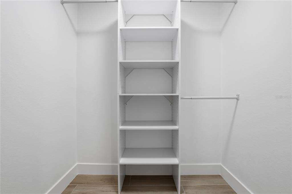 4460 Oakley Street Punta Gorda, FL 33980 - Photo 12 of 18 a view of an empty walk in closet