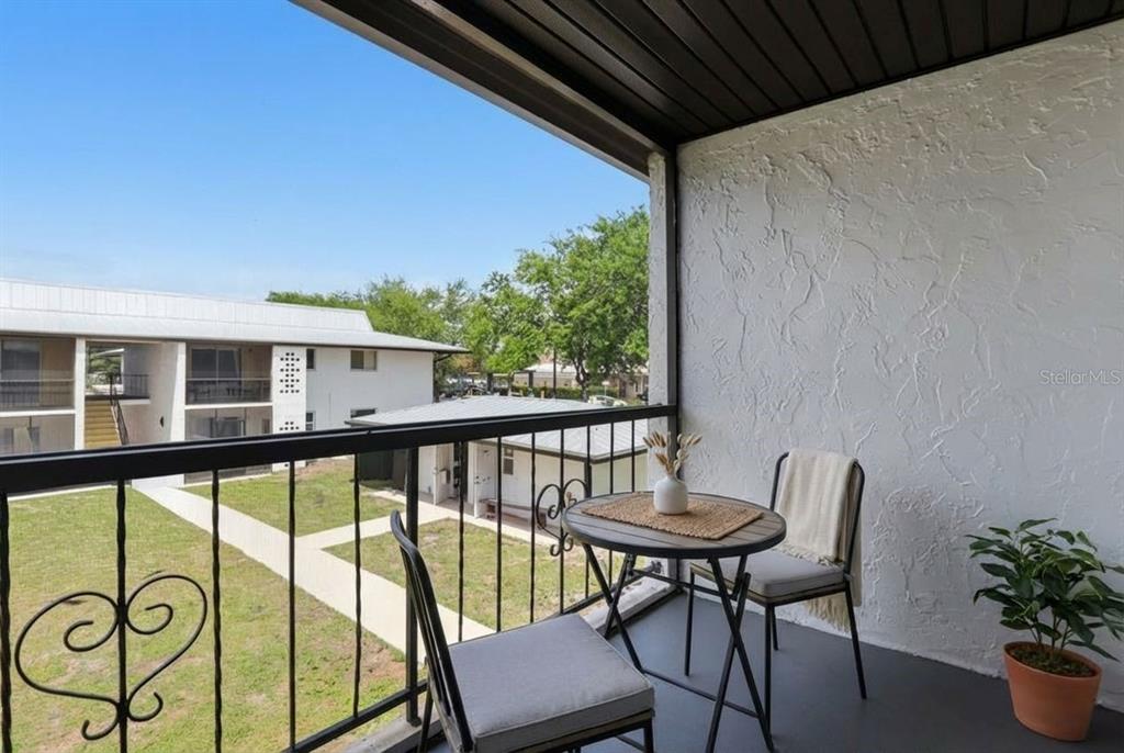4460 Oakley Street Punta Gorda, FL 33980 - Photo 18 of 18 a view of a balcony with chairs