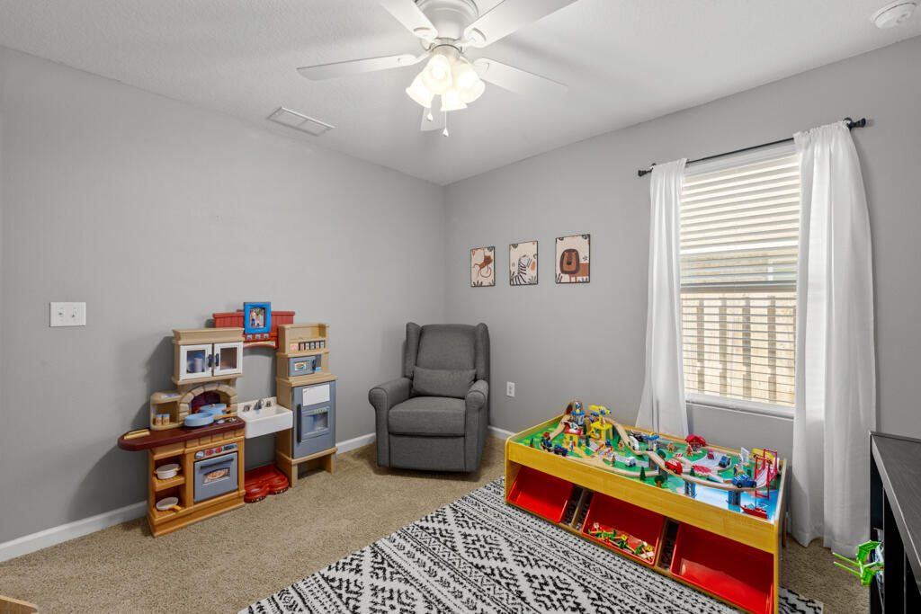 969 Merganser Way Crestview, FL 32539 - Photo 11 of 44 a room with toys and a small space