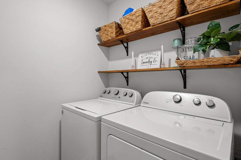 969 Merganser Way Crestview, FL 32539 - Photo 12 of 44 a utility room with dryer and washer