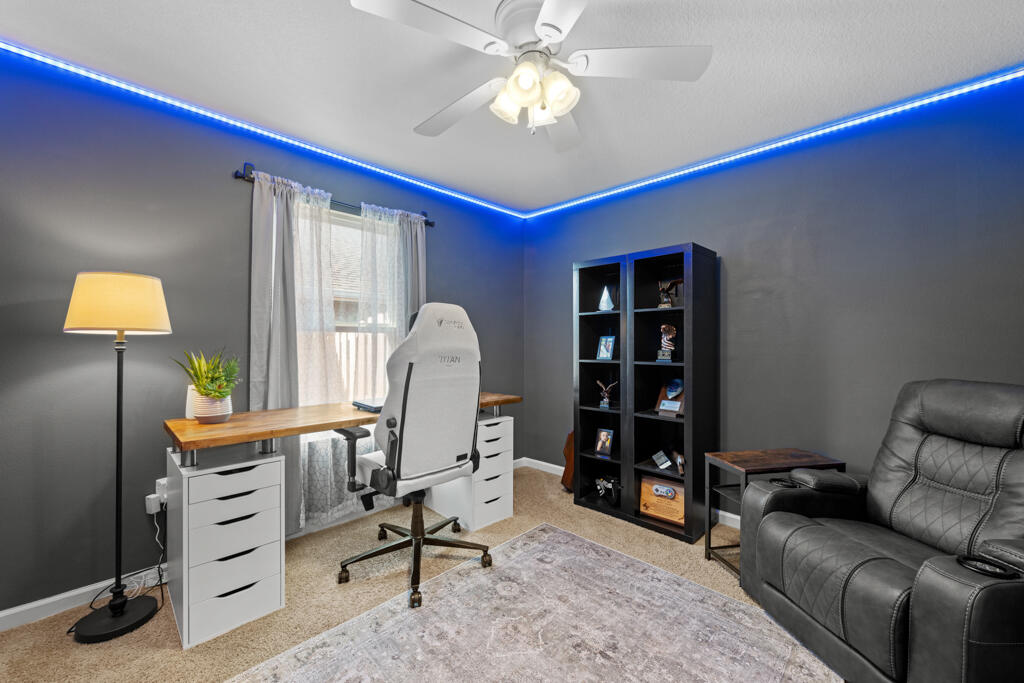 969 Merganser Way Crestview, FL 32539 - Photo 14 of 44 a view of a livingroom with furniture and a window