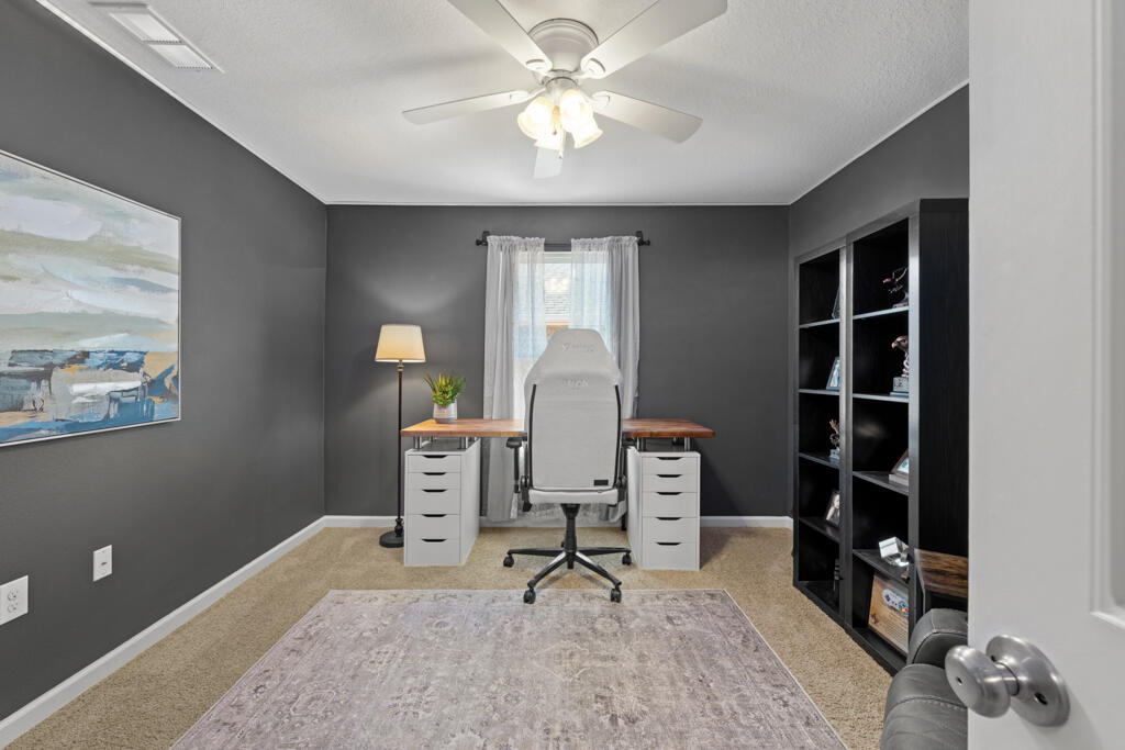 969 Merganser Way Crestview, FL 32539 - Photo 15 of 44 a bedroom with furniture and a window