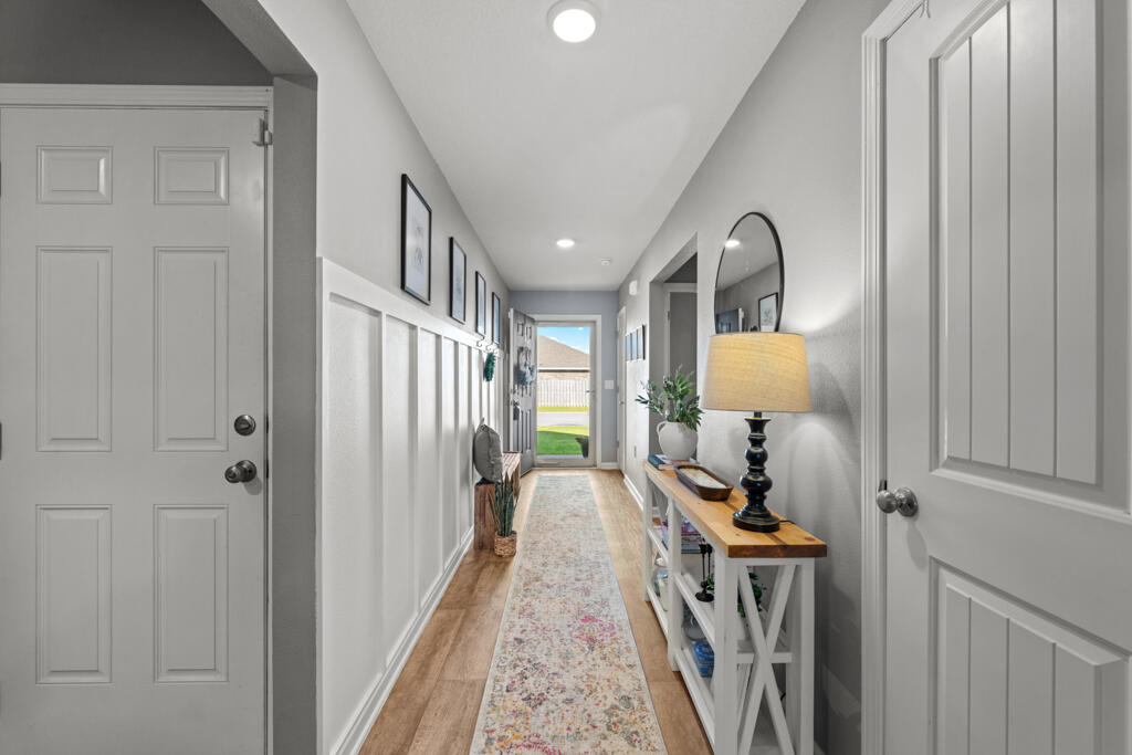 969 Merganser Way Crestview, FL 32539 - Photo 16 of 44 a view of a hallway with a elevator