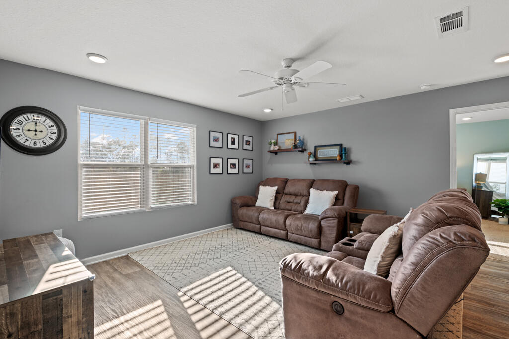 969 Merganser Way Crestview, FL 32539 - Photo 24 of 44 a bedroom with furniture and a window