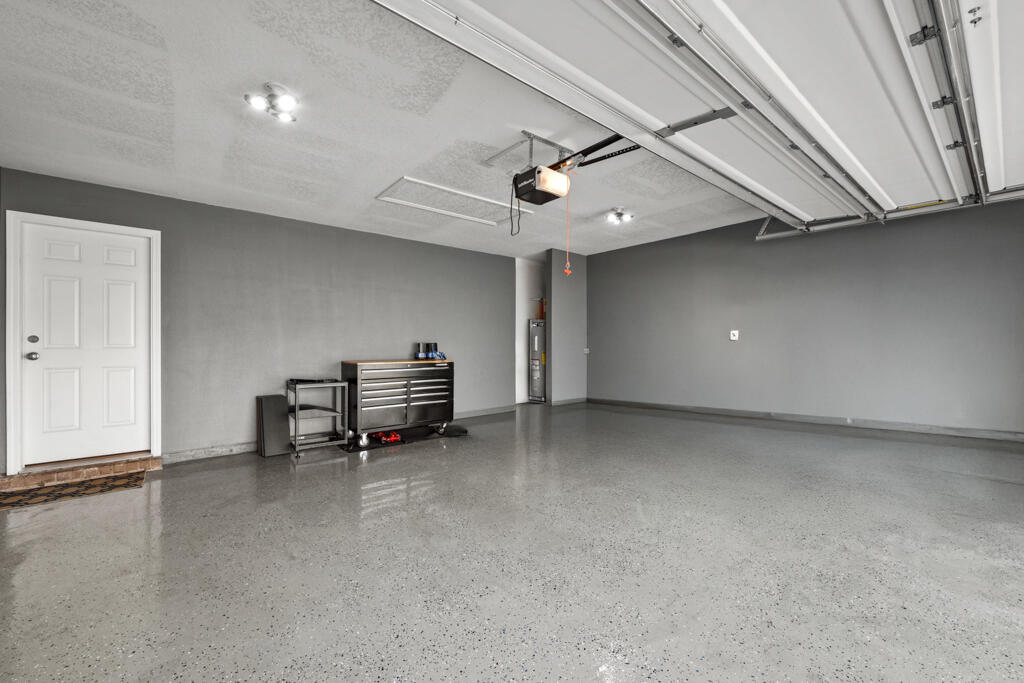 969 Merganser Way Crestview, FL 32539 - Photo 37 of 44 an empty room with a chair and ceiling fan