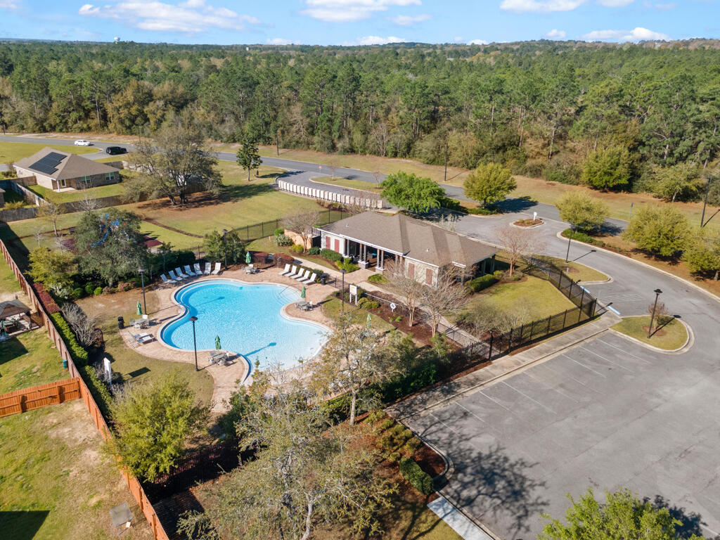 969 Merganser Way Crestview, FL 32539 - Photo 39 of 44 a view of a swimming pool with a yard