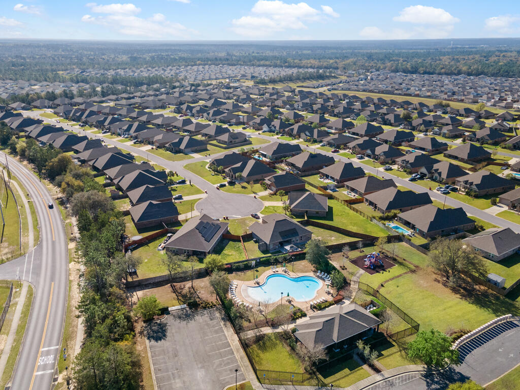 969 Merganser Way Crestview, FL 32539 - Photo 44 of 44 an aerial view of residential houses with outdoor space