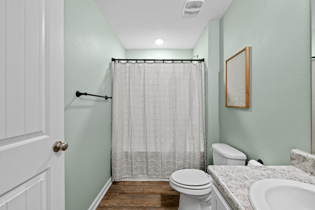 969 Merganser Way Crestview, FL 32539 - Photo 9 of 44 a bathroom with a toilet and a shower