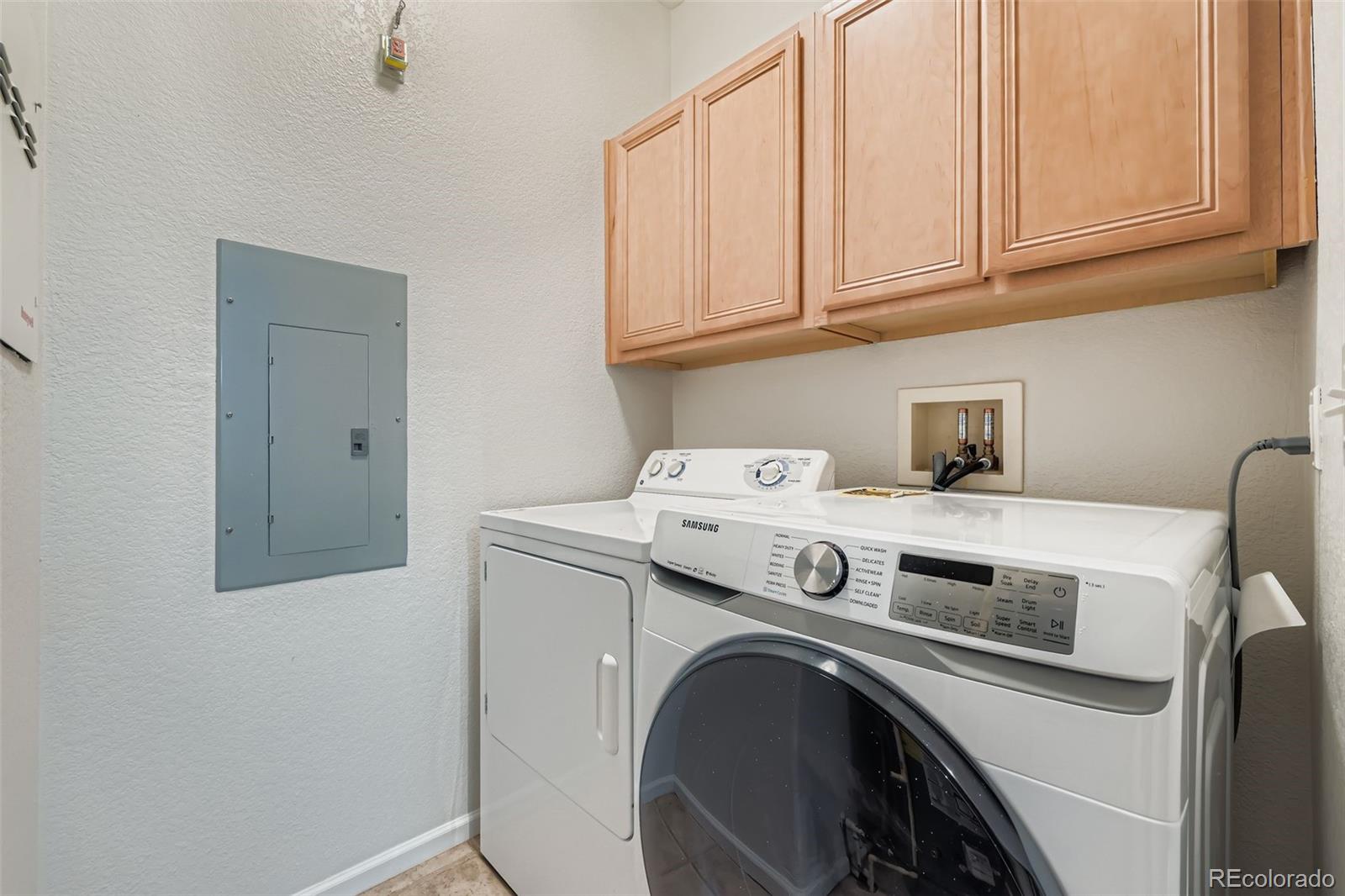 15700 East Jamison Drive, Unit 7101 Englewood, CO 80112 - Photo 11 of 31 a utility room with dryer and washer
