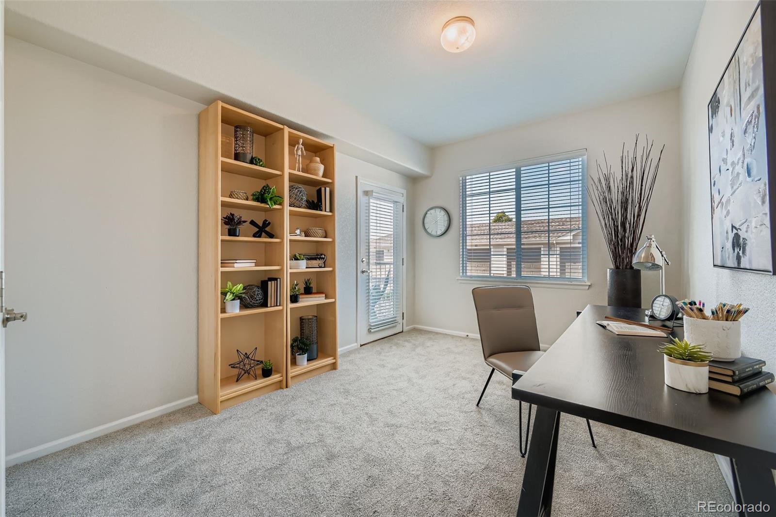 15700 East Jamison Drive, Unit 7101 Englewood, CO 80112 - Photo 16 of 31 a view of a livingroom with furniture and window
