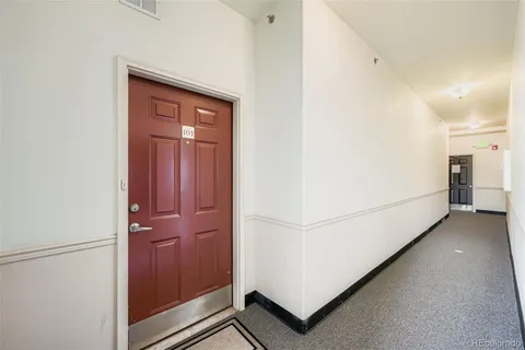 a view of hallway with washer and dryer