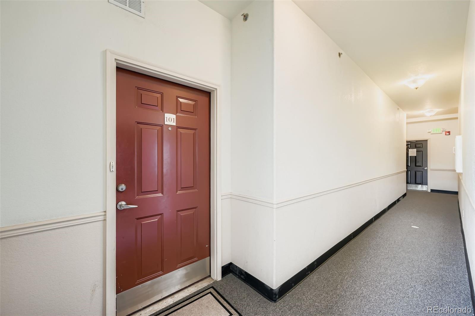 15700 East Jamison Drive, Unit 7101 Englewood, CO 80112 - Photo 2 of 31 a view of hallway with washer and dryer