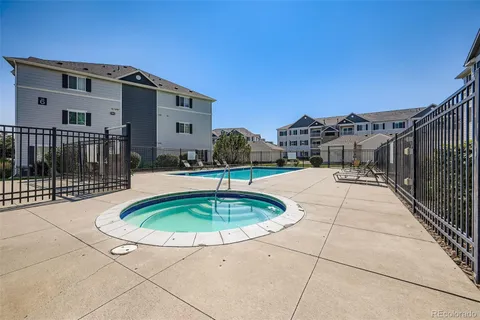 a front view of a house with a swimming pool