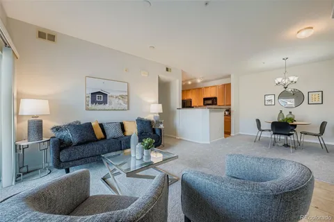 a living room with furniture and a couch