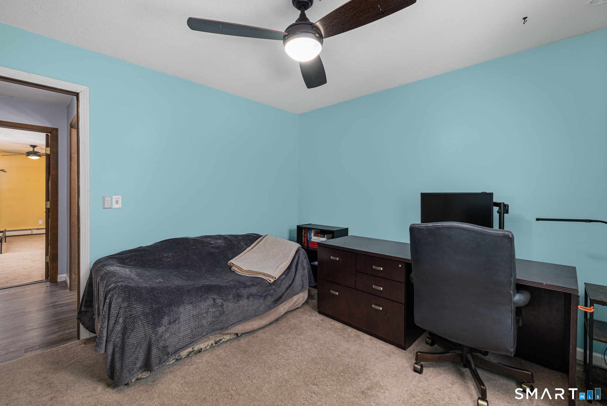 89 Kinney Hill Road Plainfield, CT 06374 - Photo 22 of 33 a bedroom with a bed and a chair