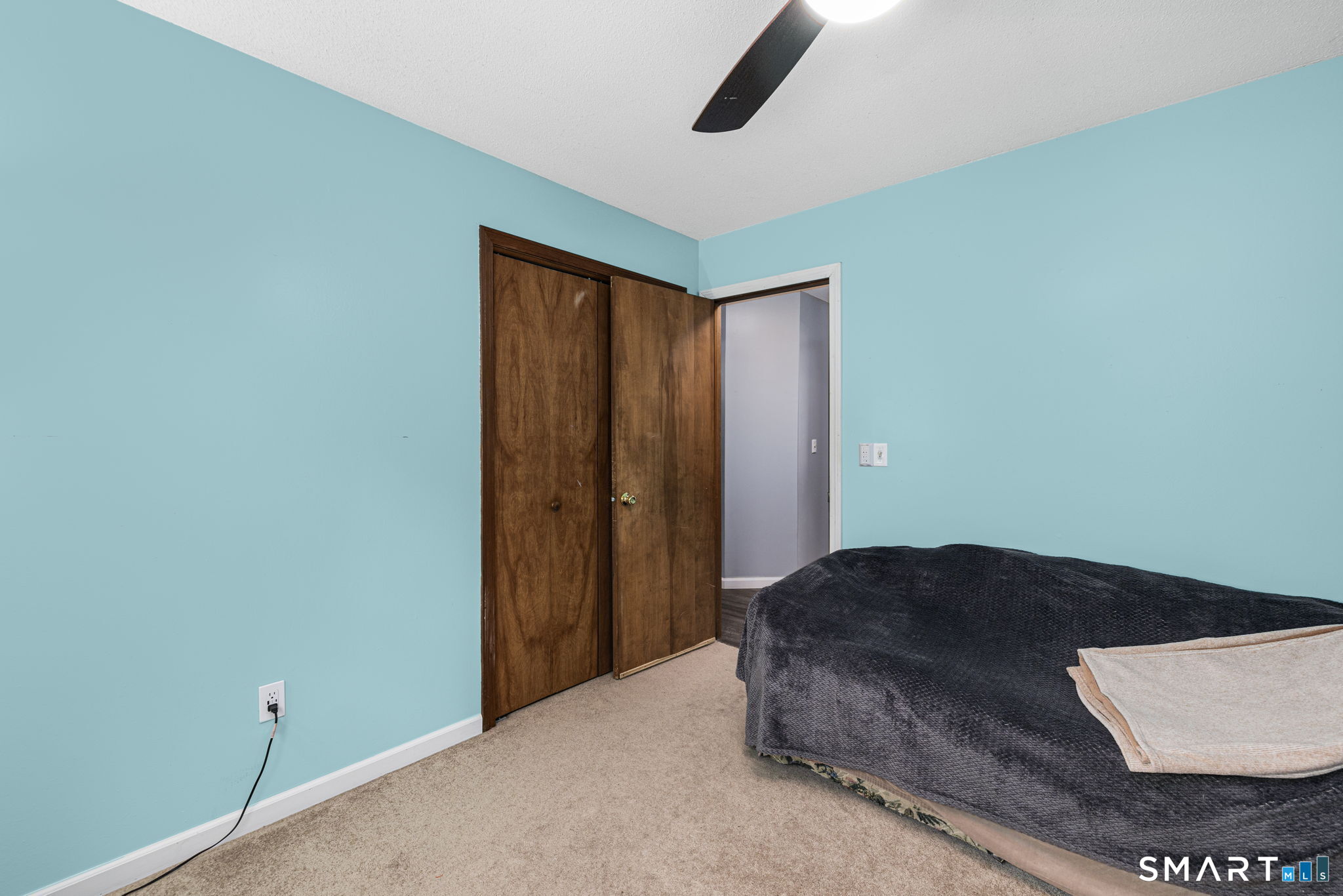 89 Kinney Hill Road Plainfield, CT 06374 - Photo 23 of 33 a bedroom with a bed and a cabinets