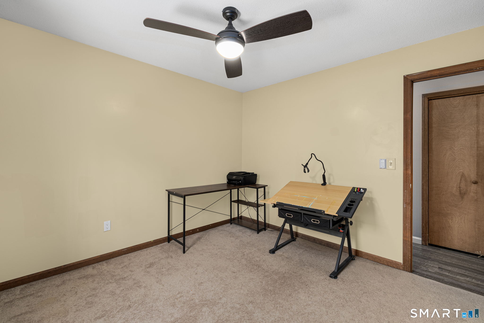 89 Kinney Hill Road Plainfield, CT 06374 - Photo 25 of 33 a living room with furniture and a ceiling fan