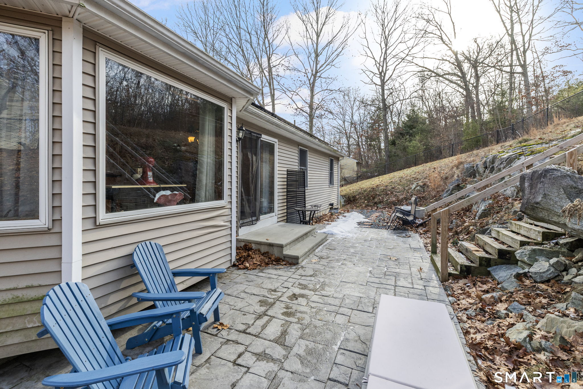 89 Kinney Hill Road Plainfield, CT 06374 - Photo 28 of 33 a view of a patio with a table and chairs and wooden fence