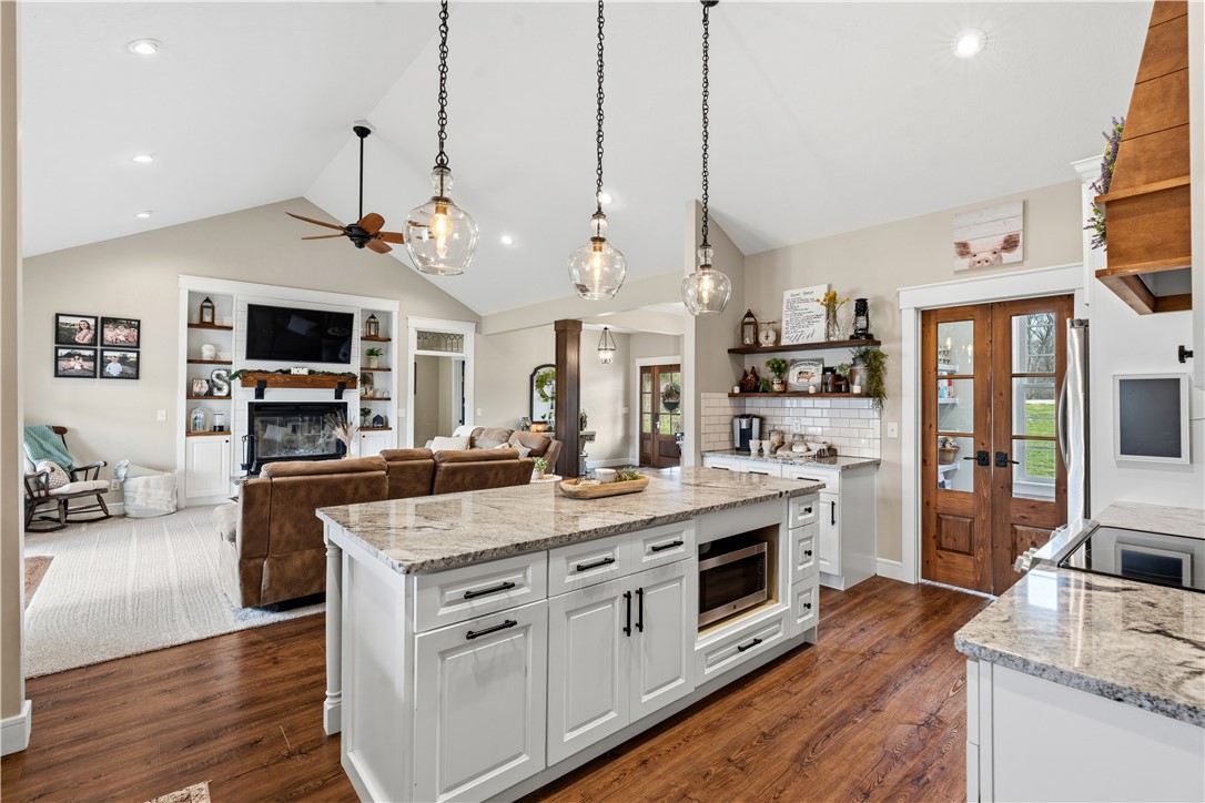 1158 Pyle Road Clarksville, OH 45113 - Photo 19 of 76 This open concept kitchen and living area features high ceilings and hardwood flooring.