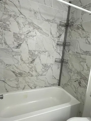 a bathroom with a bathtub