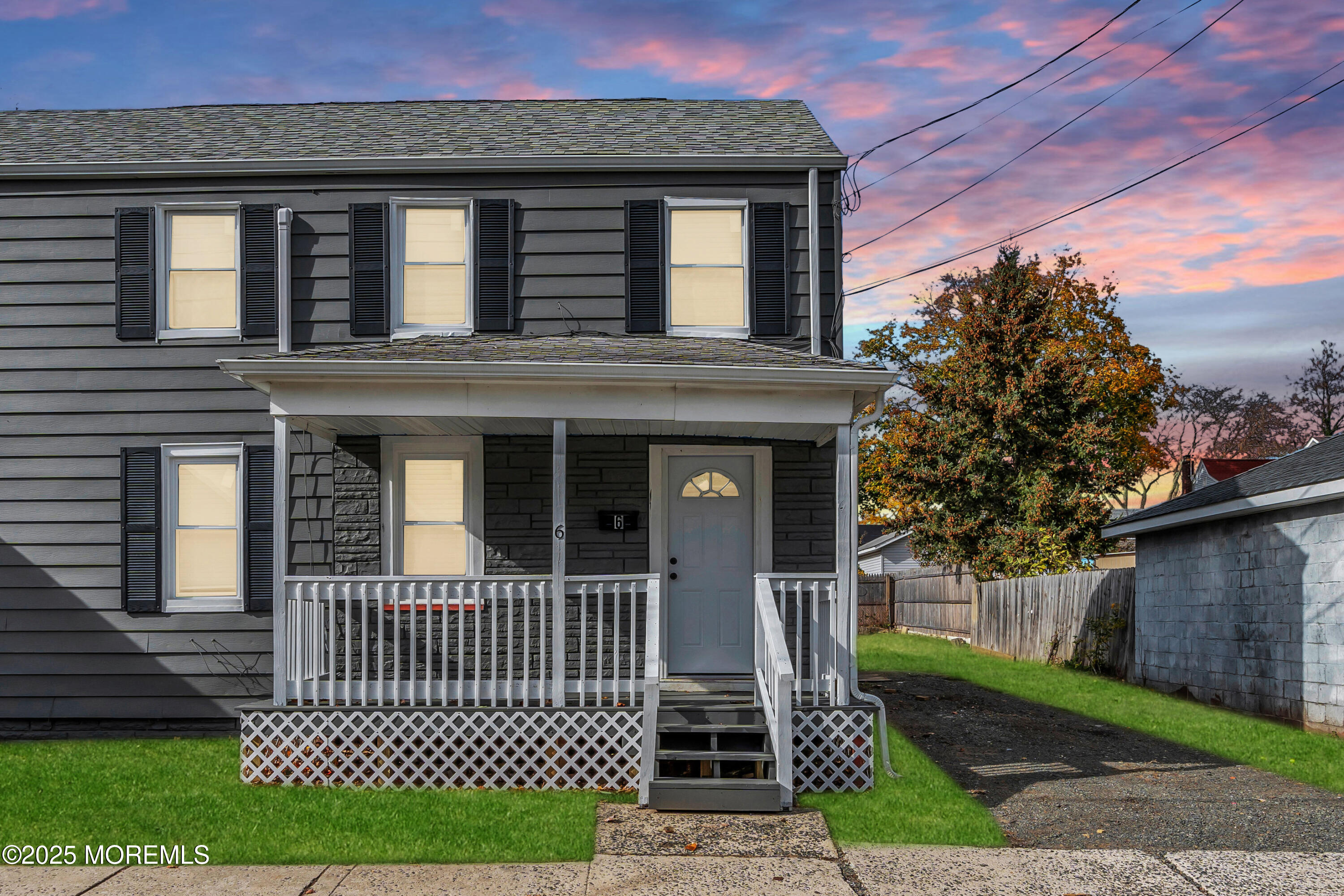6 Orchard Street Matawan, NJ 07747 - Photo 1 of 45 a front view of a house with a garden