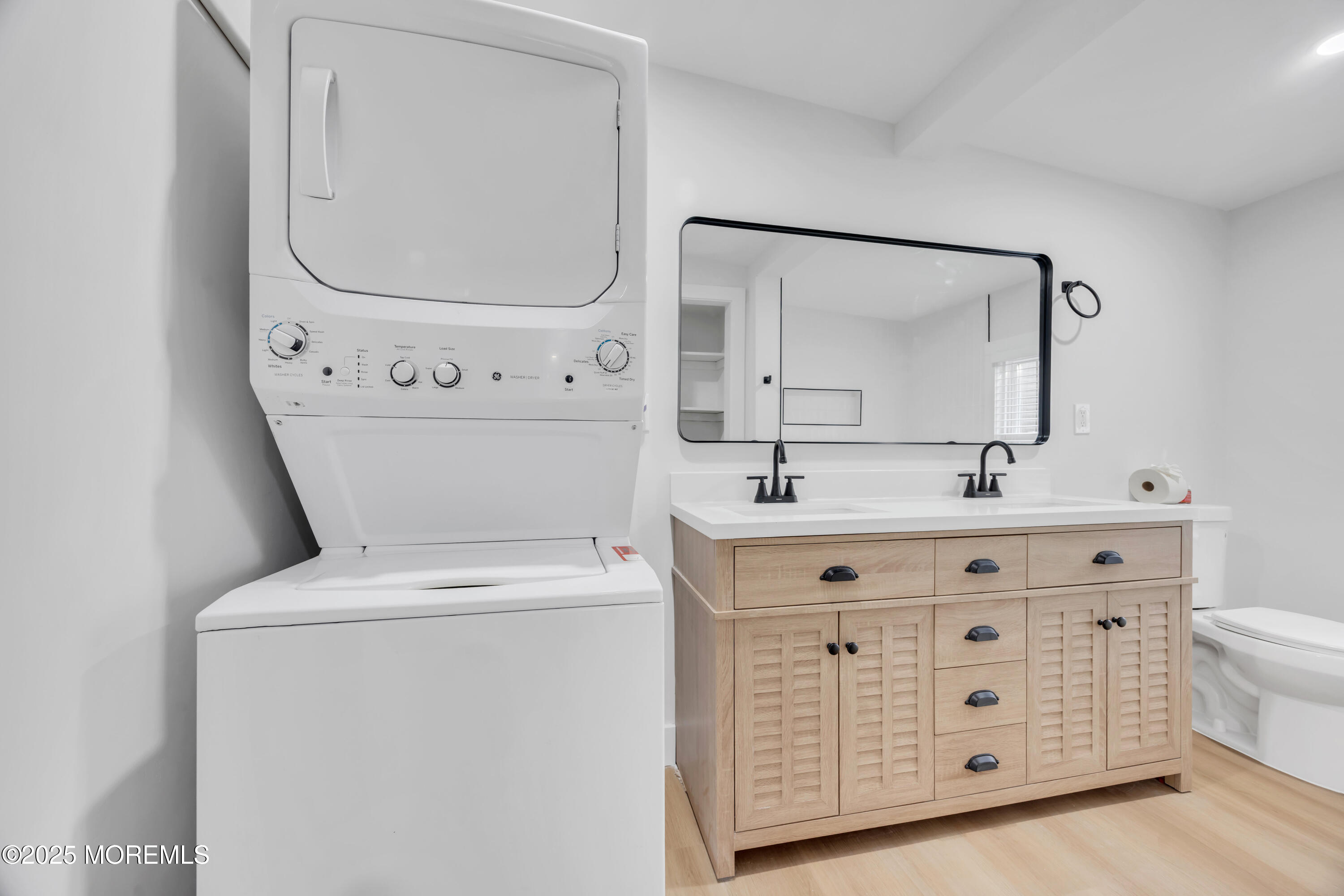 6 Orchard Street Matawan, NJ 07747 - Photo 22 of 45 a bathroom with a double vanity sink and a mirror