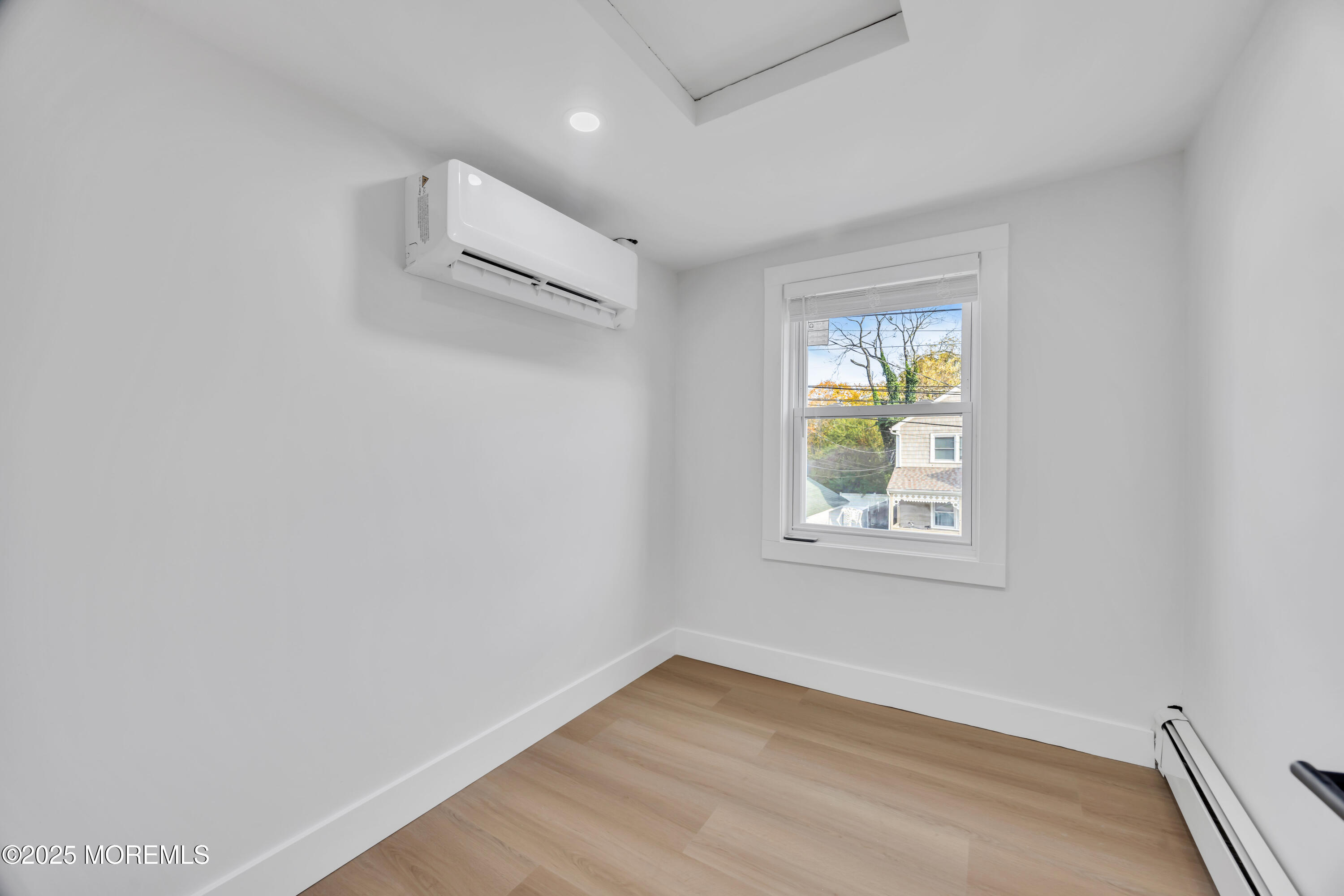 6 Orchard Street Matawan, NJ 07747 - Photo 28 of 45 an empty room with a window