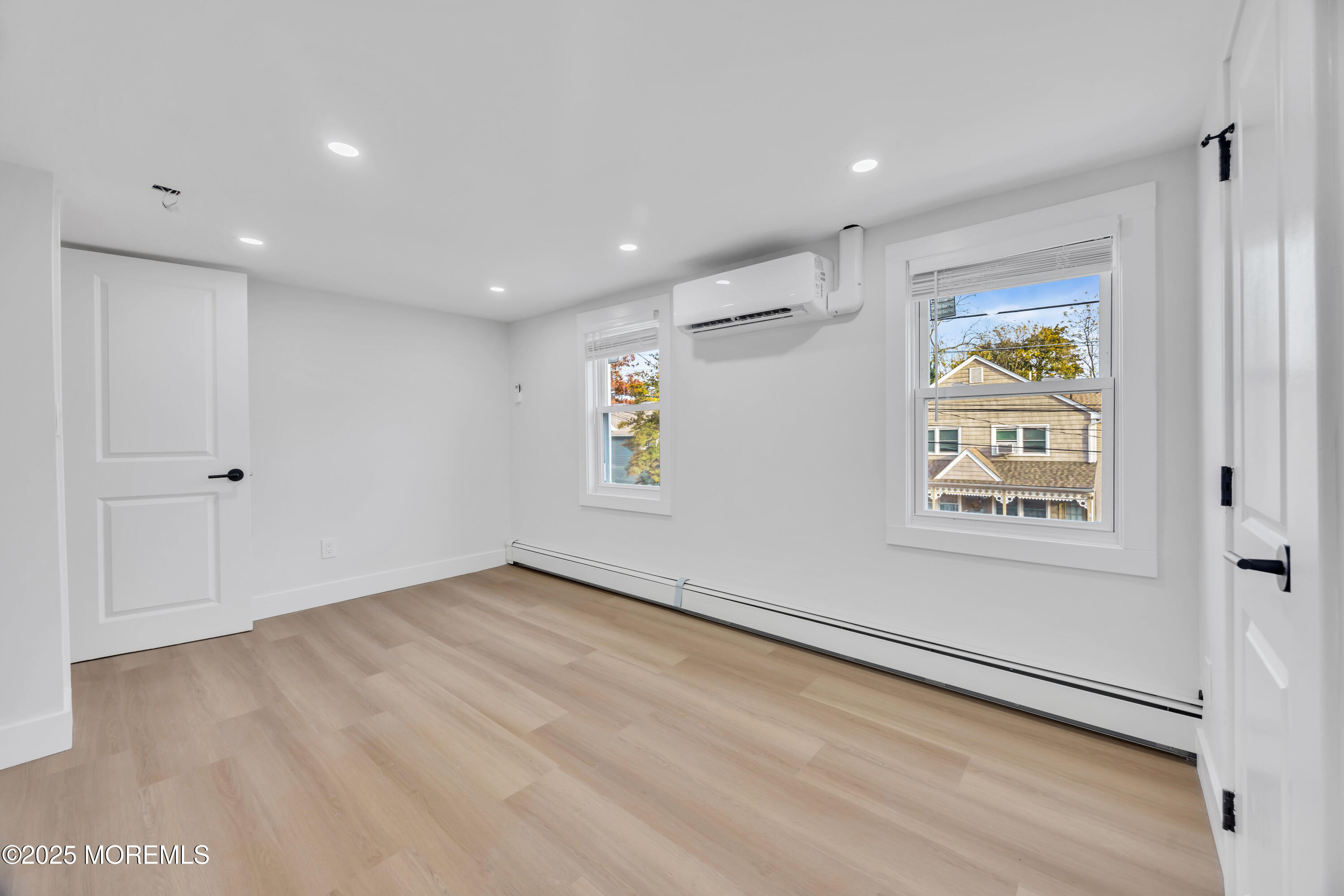6 Orchard Street Matawan, NJ 07747 - Photo 31 of 45 wooden floor in an empty room with a window