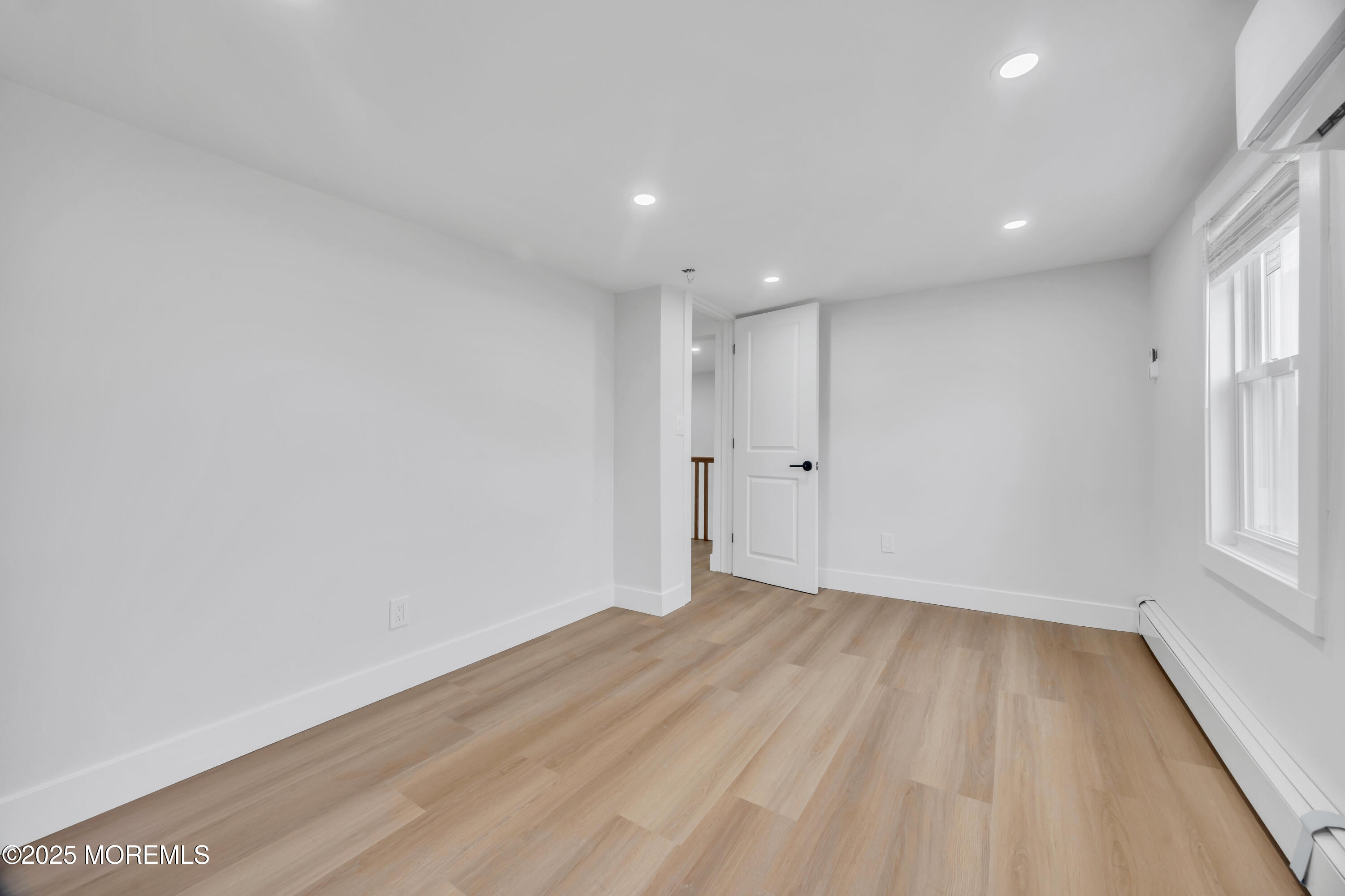 6 Orchard Street Matawan, NJ 07747 - Photo 32 of 45 wooden floor in an empty room with a window