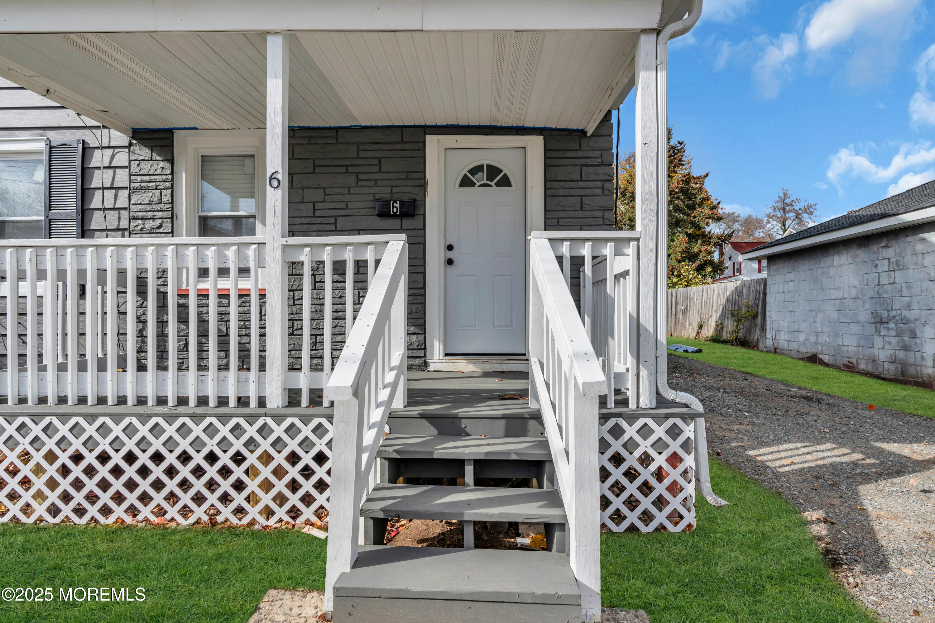 6 Orchard Street Matawan, NJ 07747 - Photo 9 of 45 a front view of a house with a garden