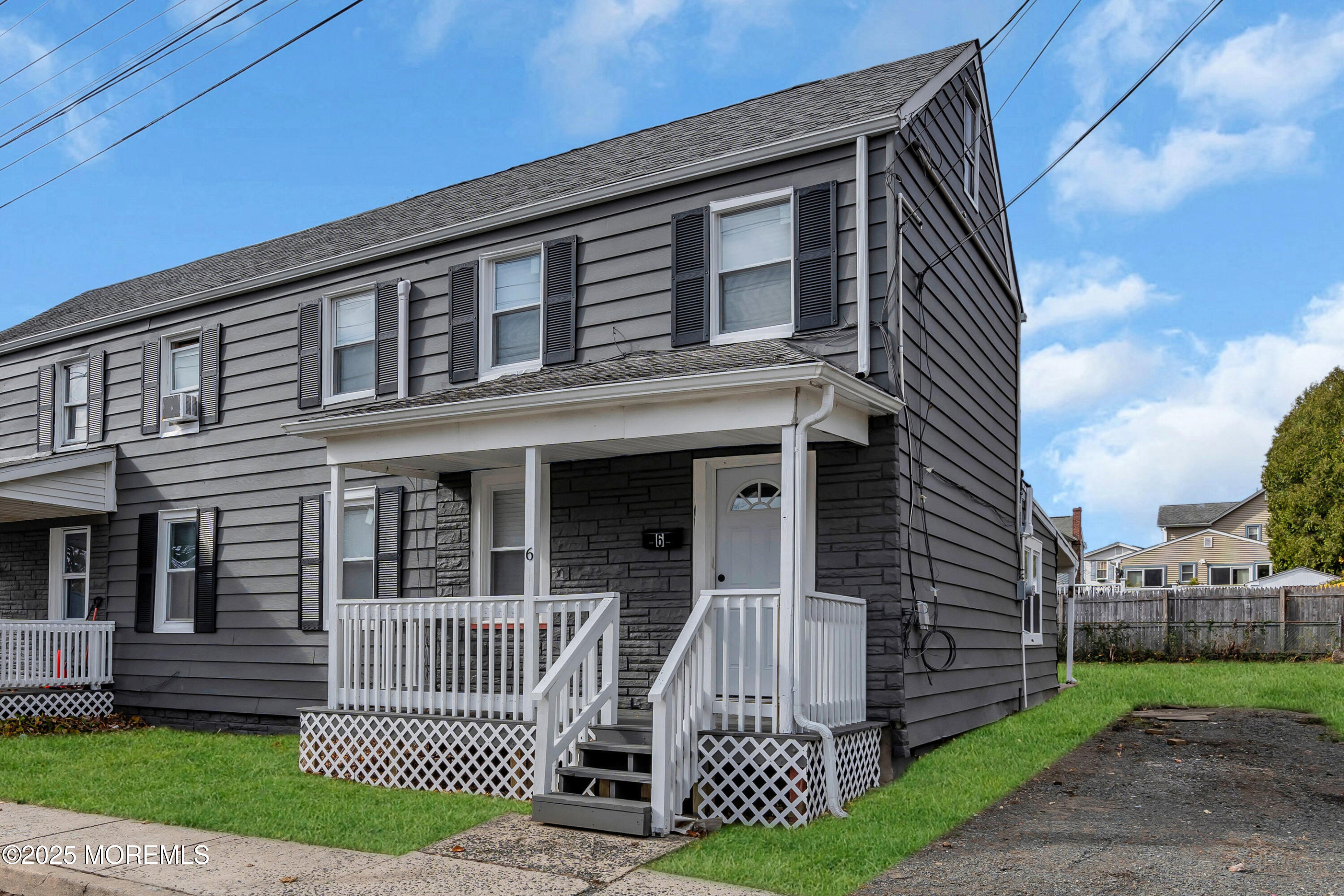 6 Orchard Street Matawan, NJ 07747 - Photo 10 of 45 a front view of a house with a yard