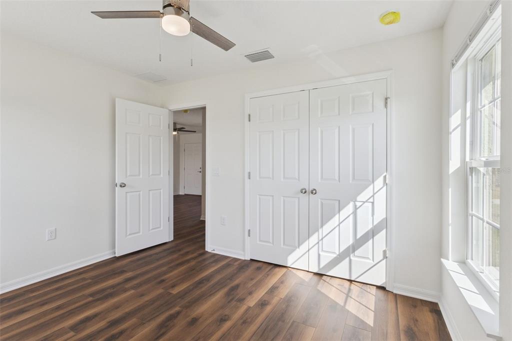 1073 North Rockingham Avenue Tavares, FL 32778 - Photo 12 of 17 a view of an entryway with wooden floor