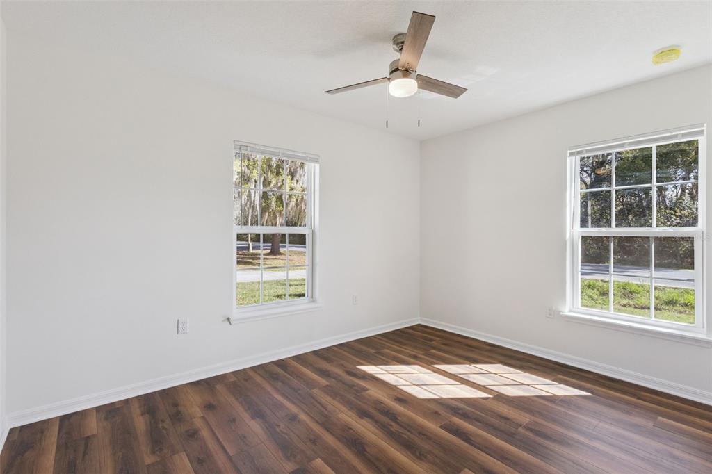 1073 North Rockingham Avenue Tavares, FL 32778 - Photo 14 of 17 an empty room with a window