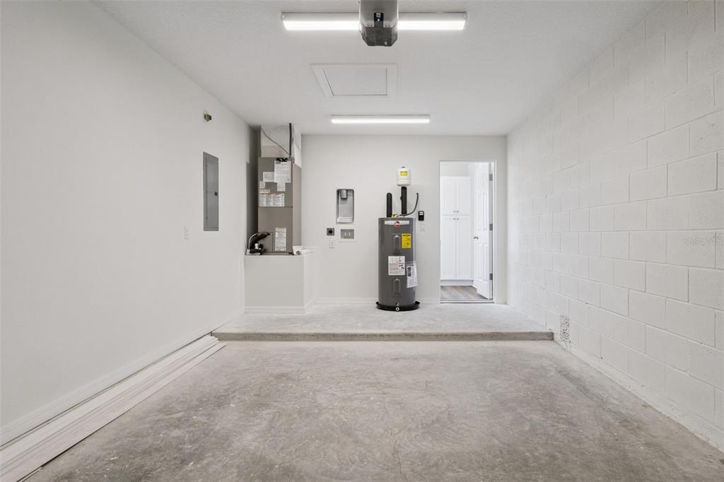 1073 North Rockingham Avenue Tavares, FL 32778 - Photo 16 of 17 wooden floor and window in a room