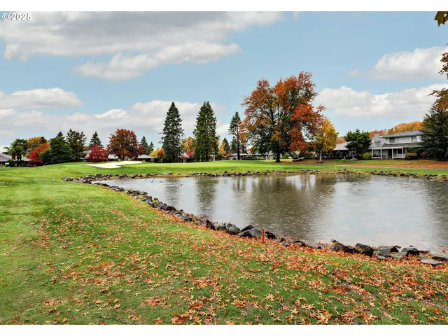 a view of a lake with a big yard