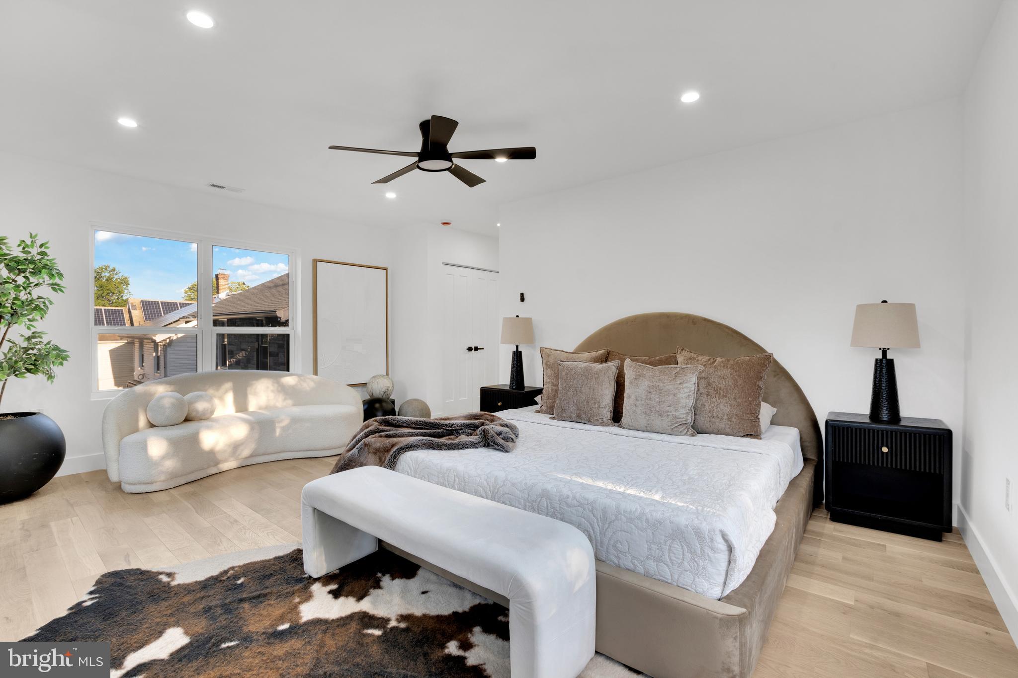 1312 Franklin Street Northeast Washington, DC 20017 - Photo 25 of 42 a bedroom with a bed and furniture