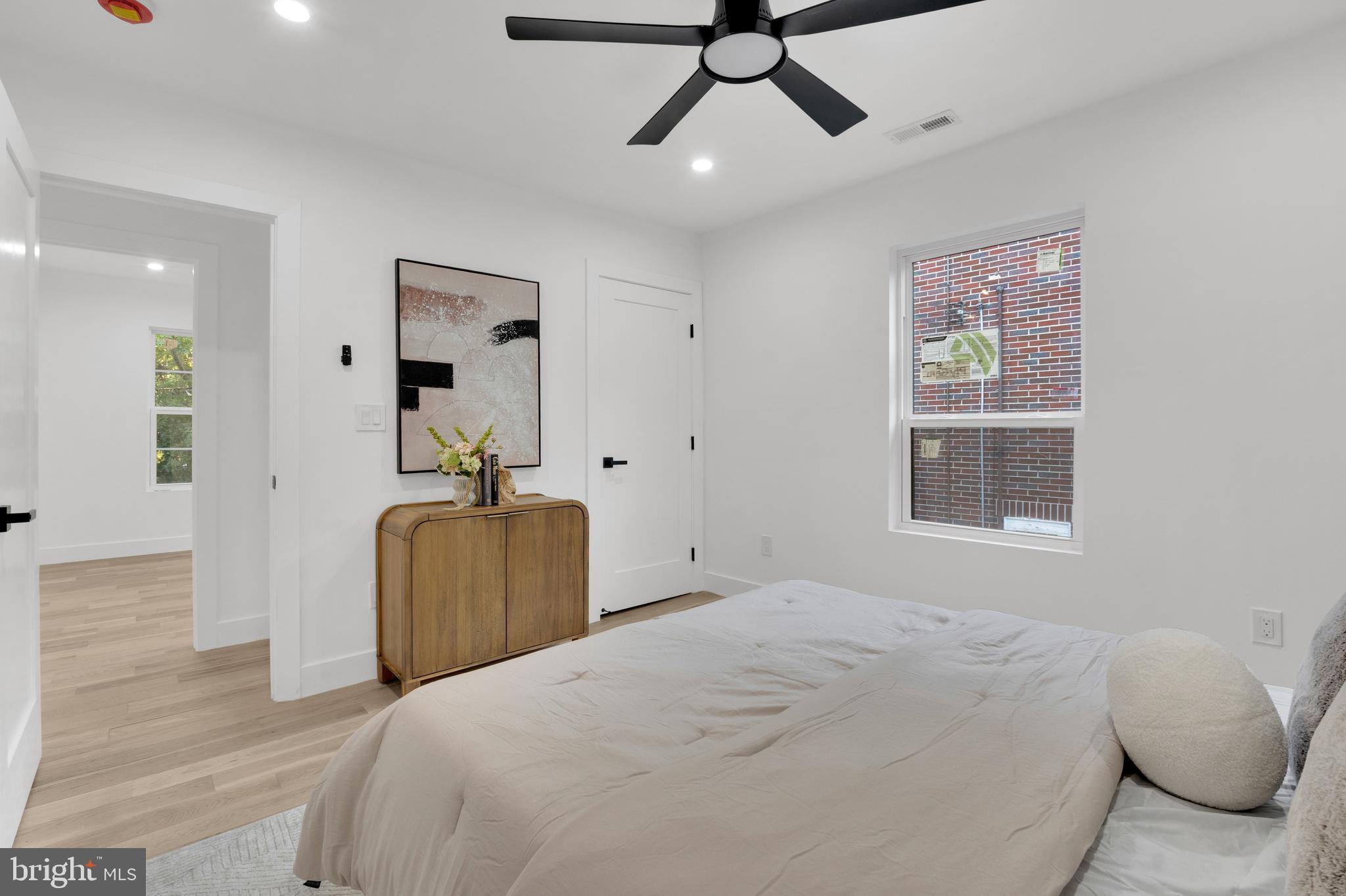 1312 Franklin Street Northeast Washington, DC 20017 - Photo 30 of 42 a bedroom with a bed and window