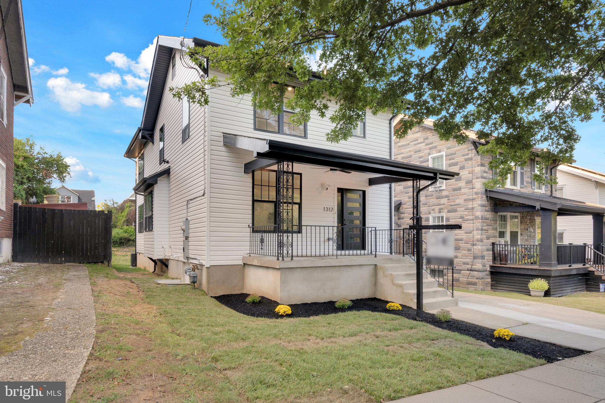 1312 Franklin Street Northeast Washington, DC 20017 - Photo 4 of 42 a view of a house with backyard and sitting area