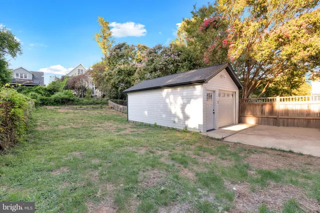 a view of garage and yard