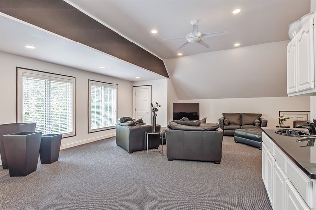610 South Ridge Road Lake Forest, IL 60045 - Photo 18 of 24 a living room with furniture and a flat screen tv