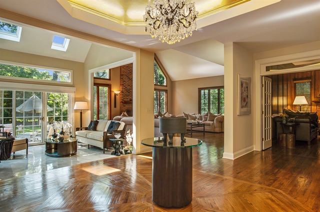 610 South Ridge Road Lake Forest, IL 60045 - Photo 8 of 24 a living room with fireplace furniture and a large window