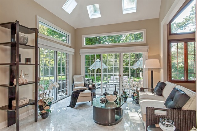 610 South Ridge Road Lake Forest, IL 60045 - Photo 9 of 24 a living room with furniture and a potted plant