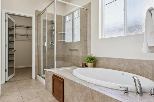 a bath tub sitting next to a bathroom