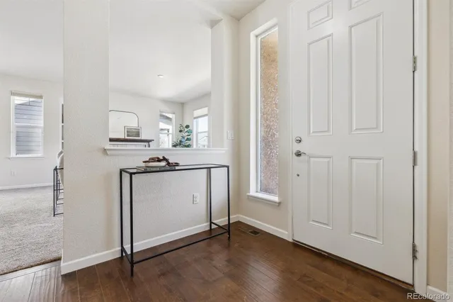 a view of cabinets with wooden floor