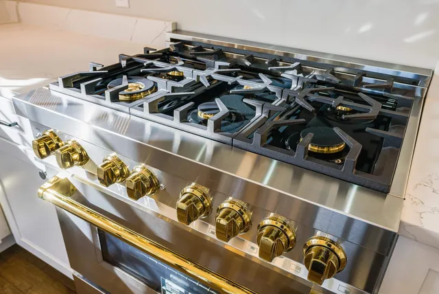 a view of a balcony with wooden floor and fence