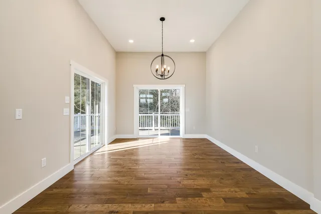 a bath room with a toilet sink and a shower