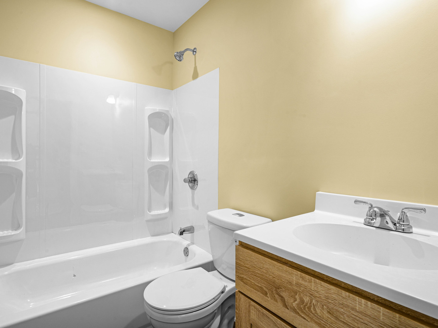 422 Sherman Street Joliet, IL 60433 - Photo 20 of 20 a bathroom with a sink a toilet and bathtub