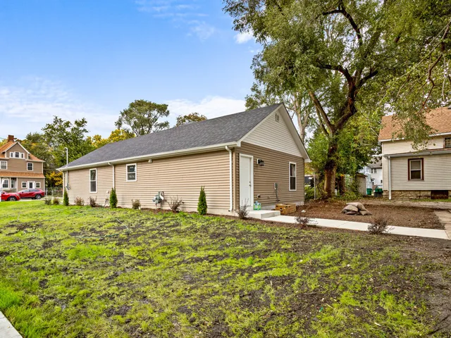 a house with trees in the background