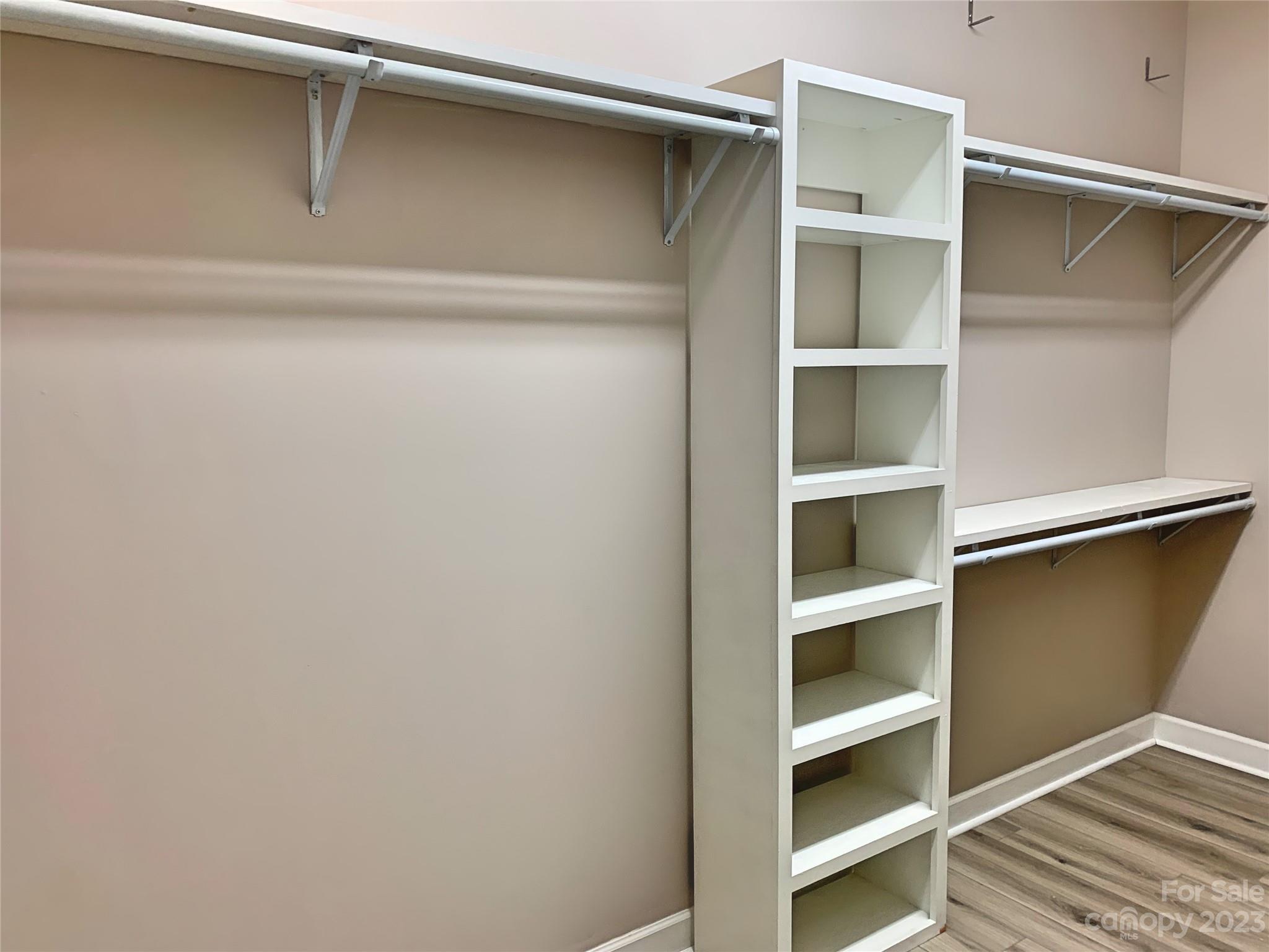 2160 Startown Road Newton, NC 28658 - Photo 27 of 40 a view of walk in closet with empty racks